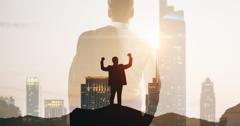 back-view-successful-european-men-standing-abstract-city-background-with-sunlight-success-future-tomorrow-concept-double-exposure-scaled.jpg